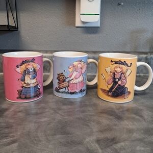 Three Mug Set Mindy Cain Country Garden Angel Pink Blue Yellow